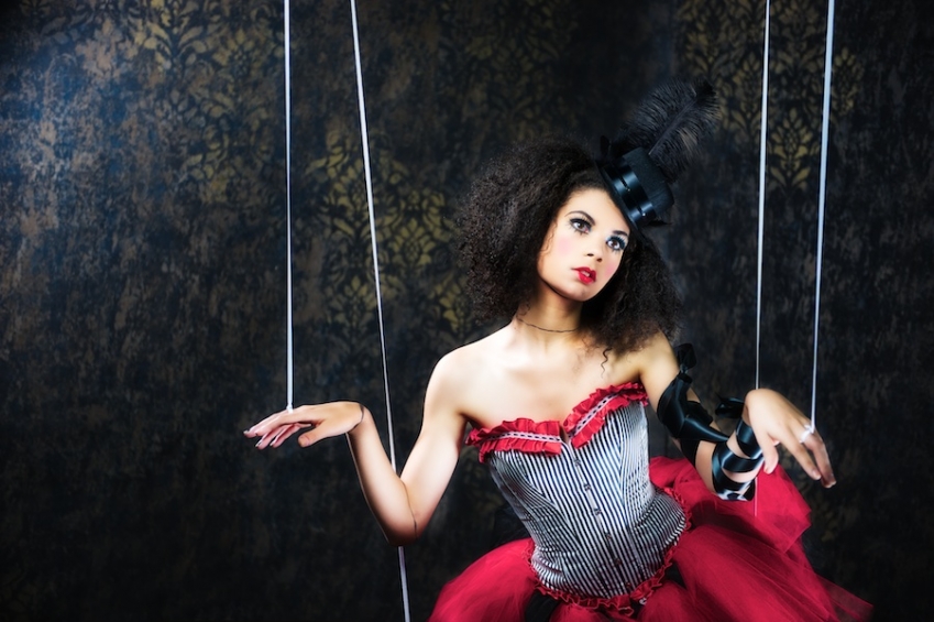 female model posing as marionette