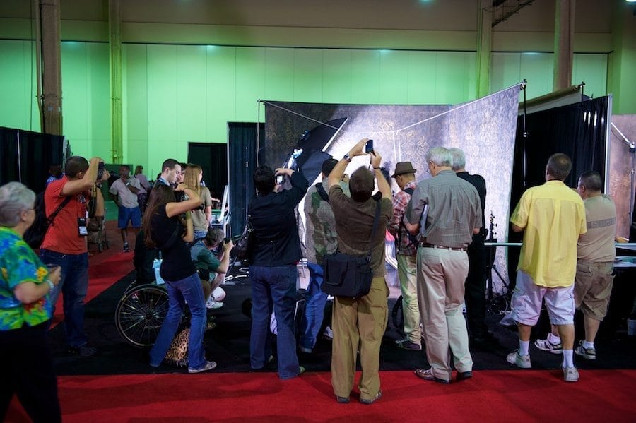 Westscott Models Photographers Crowd Around model at Westcott booth