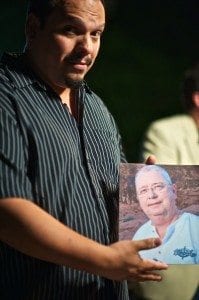 RC Concepcion holding photo of Ken Toney