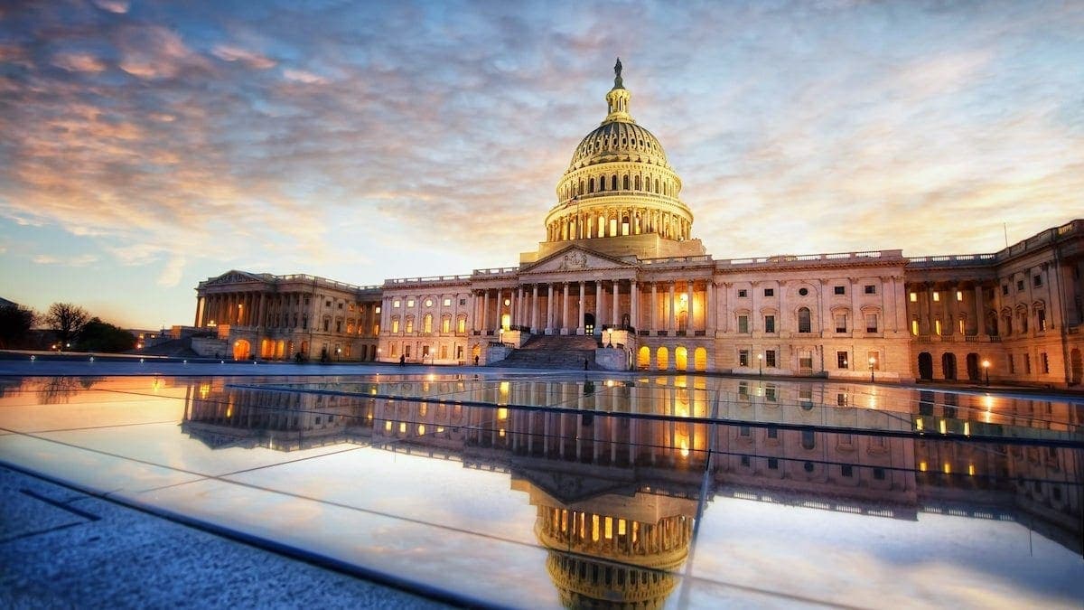 U.S. Capitol building reflected in glass